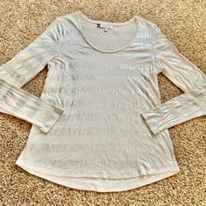 Jennifer Lopez large striped long sleeve top